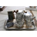 A vintage Picquot ware tea service with tray