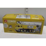 A boxed Corgi die-cast truck model