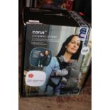 A boxed baby carrier