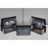Five boxed die-cast sports car models