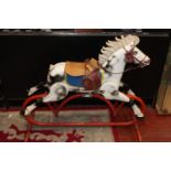 A vintage metal Triang child's rocking horse. postage unavailable