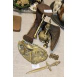 A job lot of assorted brass ware items and cast iron shoe last. Postage unavailable