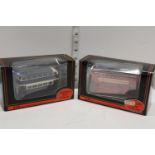 Two boxed exclusive first editions die-cast buses