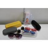 A selection of Sunglasses and beauty products