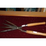 A pair of four bladed garden shears. Postage unavailable