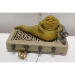 A 1980's Jabba the Hut model and accessory