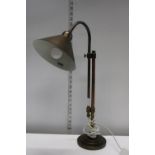 A vintage copper and brass adjustable table lamp. postage unavailable