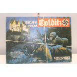 A boxed Colditz board game (unchecked)