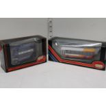 Two boxed exclusive first editions die-cast buses