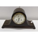 A vintage Napoleon hat mantle clock with key