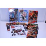 A selection of Action Man books and a Harry Potter Lego Book