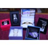 A selection of assorted boxed watches