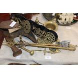 A job lot of assorted brass items and a cast iron shoe last. postage unavailable