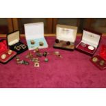 A collection of vintage cufflinks and spares