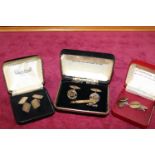 Three pairs of 925 silver gilt cufflinks and tie pin