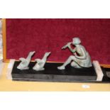 An art deco figural group of marble base