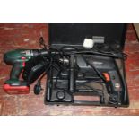 A black and decker hammer drill and cordless drill with charger