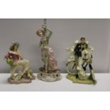 Three assorted ceramics figurines, postage unavailable