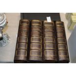 Volumes 1-4 of P.Virgilii Maronis Opera in latin stamped London 1793 on the spine