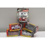 Six boxed die-cast models