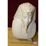 A heavy bust of Tutankhamun