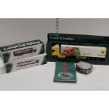 A selection of Eddie Stobart die-cast models and other items
