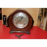 A Art Deco period wooden cased mantle clock, Leeds Maker
