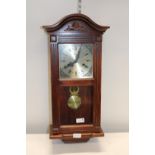 A vintage Lincoln 31 day wall clock, postage unavailable