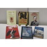 A selection of German WW2 books including 'The scourge of the Swastika' with original dust jacket