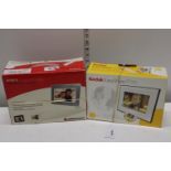 Two boxed digital photo frames