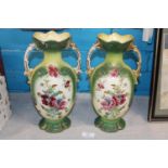 A pair of antique ceramic vases