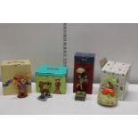 Four boxed character themed collectables including Disney