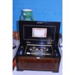 A Eight Airs antique cylinder music box (in need of restoration) shipping unavailable
