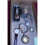 A job lot of assorted watches and time pieces