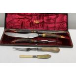 A bone handled carving set (case a/f)