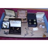 A selection of costume jewellery cufflinks