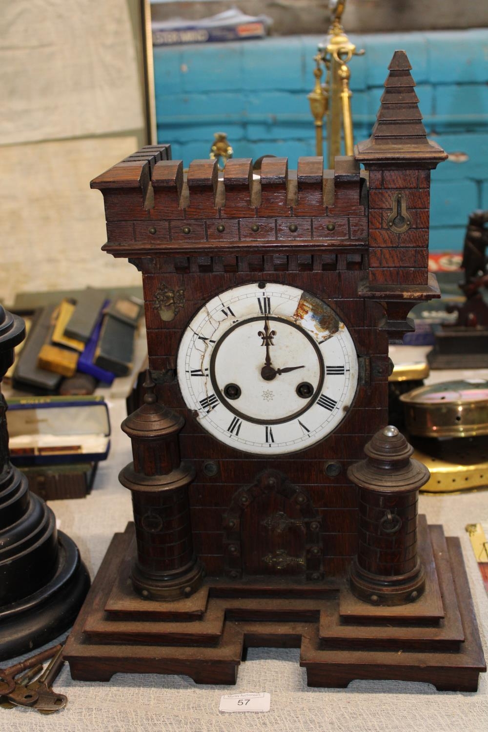 A antique wooden cased mantle clock a/f. postage unavailable