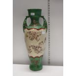 A large early 20th century vase with handles, shipping unavailable