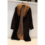 A vintage ladies synthetic fur coat