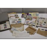 A job lot of first day covers and stamp albums