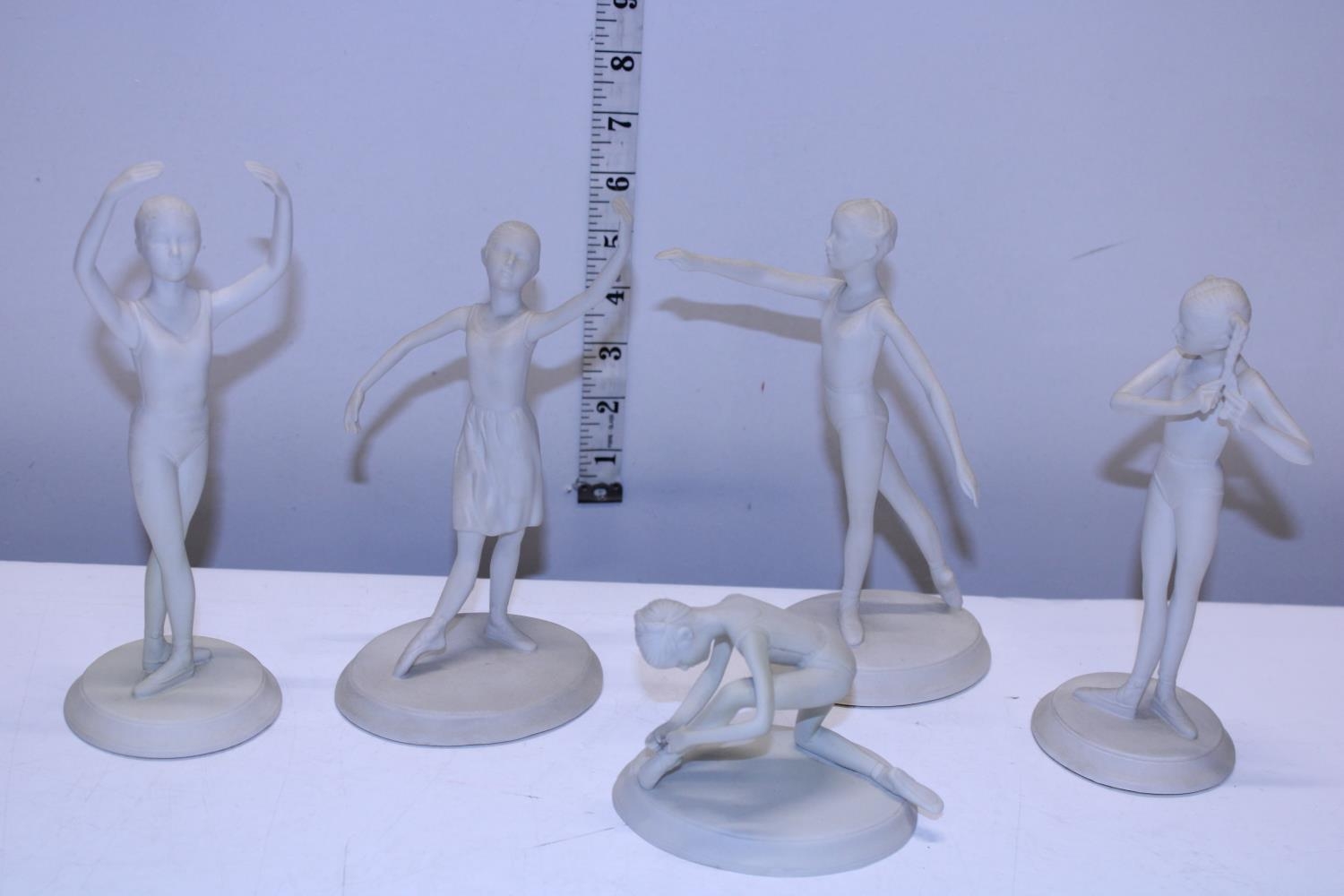 Five porcelain figures by Brenda Naylor of ballet dancers