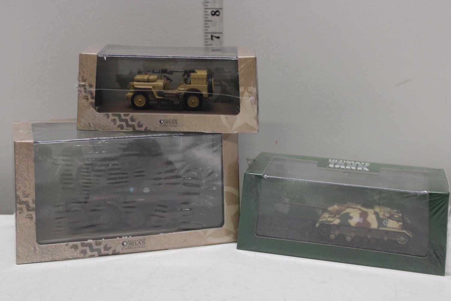 Three boxed Atlas military models