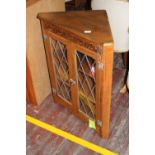 A vintage glazed corner cupboard. collection only