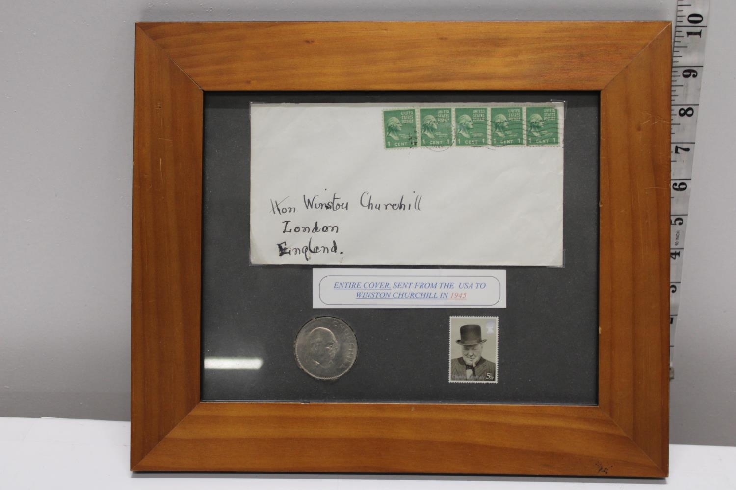 A framed selection of Winston Churchill ephemera