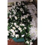 A job lot of artificial flowers