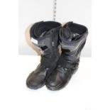 A pair of Teknic motorbike boots size 42