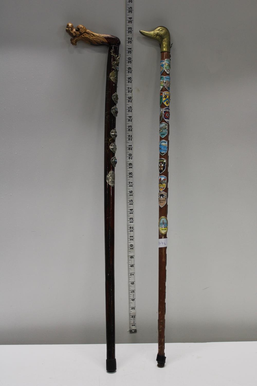 Two vintage walking sticks, postage unavailable