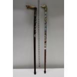 Two vintage walking sticks, postage unavailable