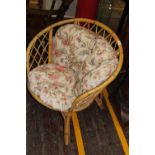 A vintage wicker work arm chair. collection only