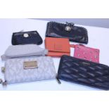 A job lot of assorted ladies designer purses including DKNY
